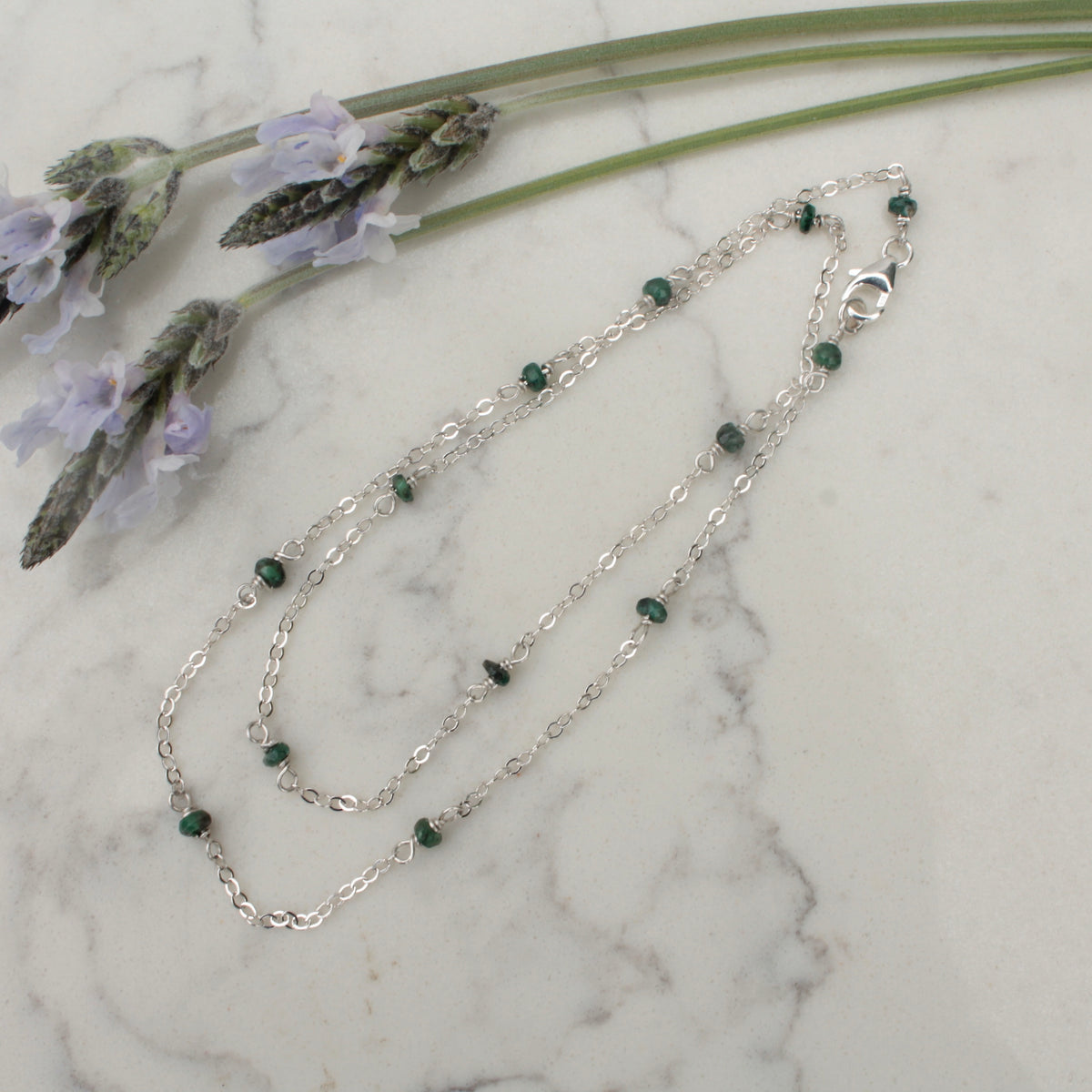 Tiny emerald beads strung on sterling silver chain necklace